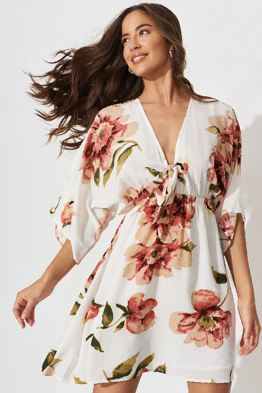 ava-dress-in-white-with-rust-floral