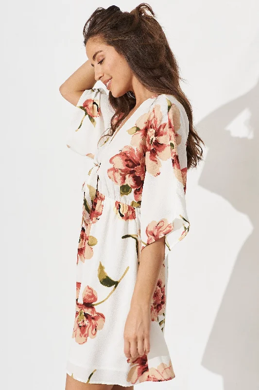 ava-dress-in-white-with-rust-floral