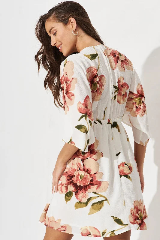 ava-dress-in-white-with-rust-floral