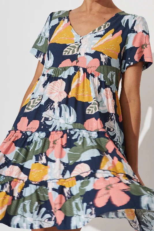 brisha-smock-dress-in-navy-with-tropical-floral