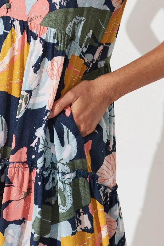 brisha-smock-dress-in-navy-with-tropical-floral