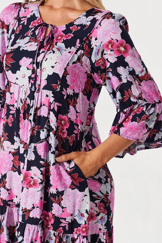 caressa-dress-in-navy-with-pink-floral