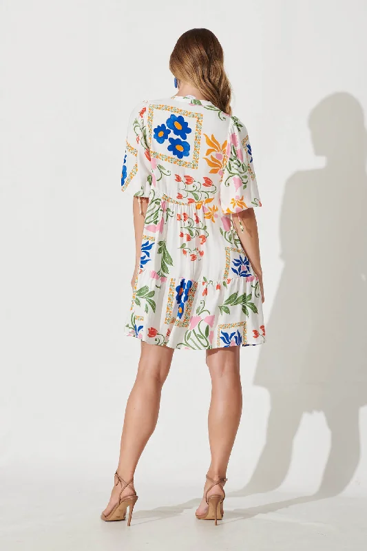 emelyn-smock-dress-in-white-with-bright-flowers