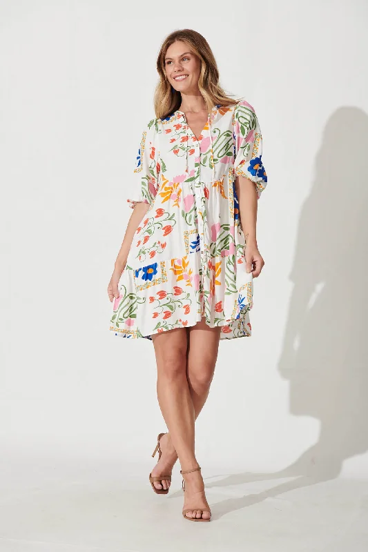 emelyn-smock-dress-in-white-with-bright-flowers