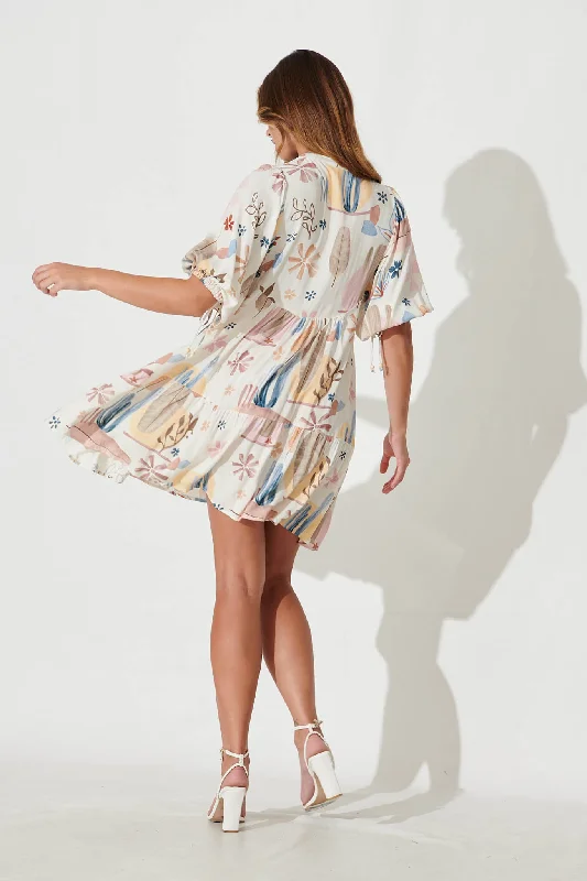 emelyn-smock-dress-in-white-with-multi-desert-print