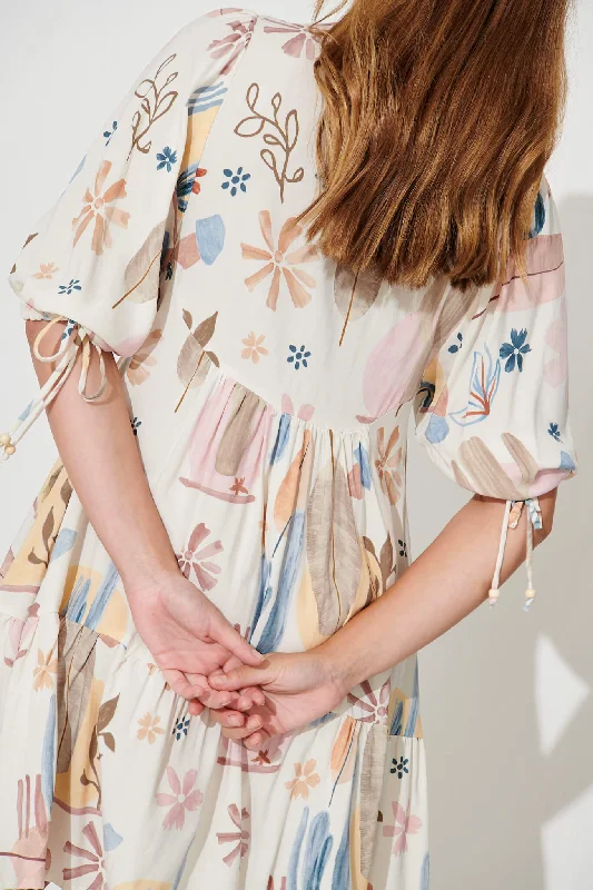 emelyn-smock-dress-in-white-with-multi-desert-print