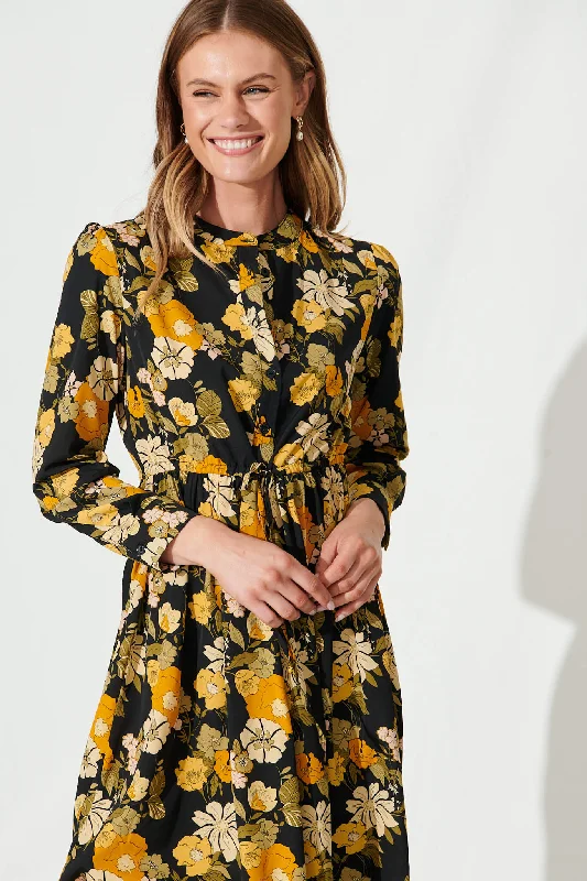 kelsey-dress-in-black-with-mustard-floral