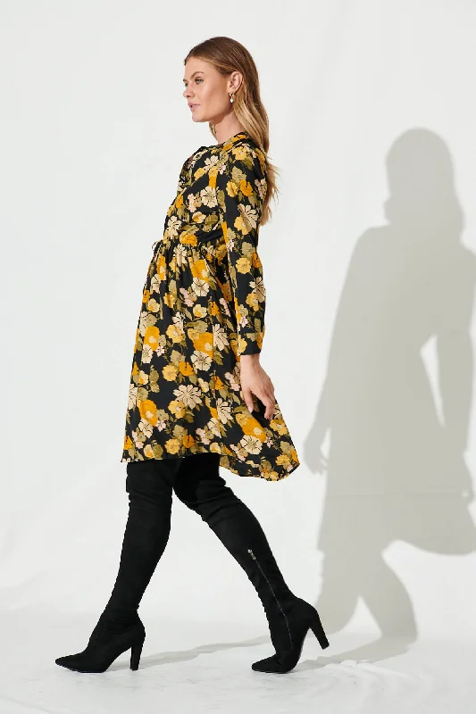 kelsey-dress-in-black-with-mustard-floral