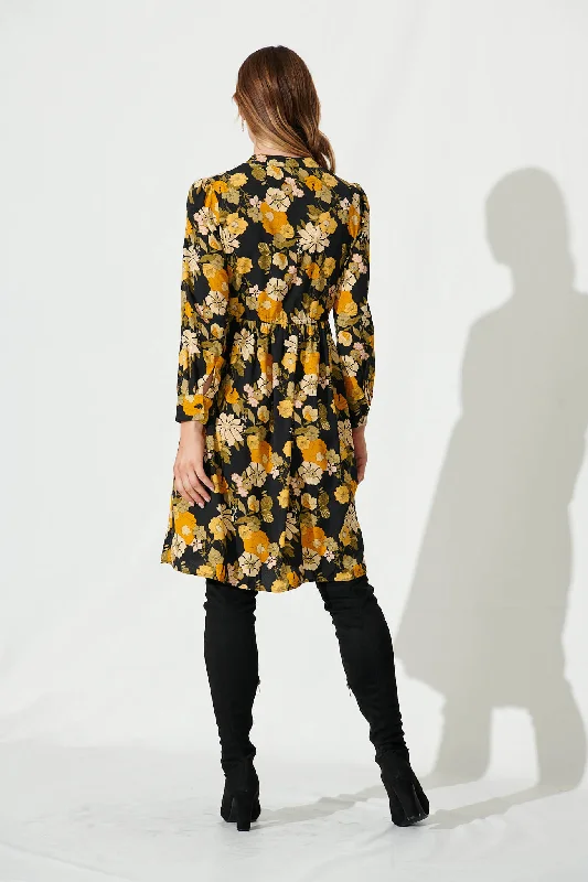 kelsey-dress-in-black-with-mustard-floral