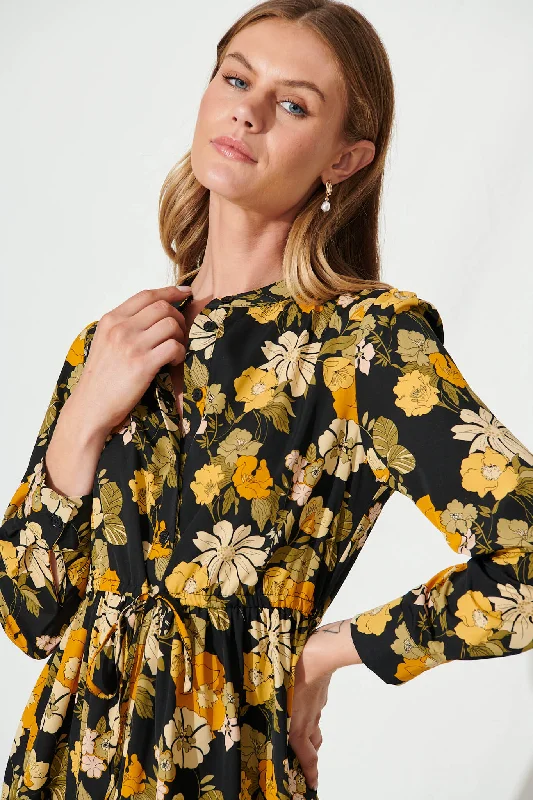 kelsey-dress-in-black-with-mustard-floral